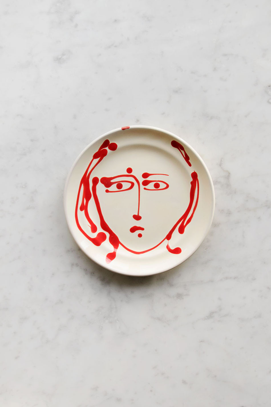 Assiett Face Red