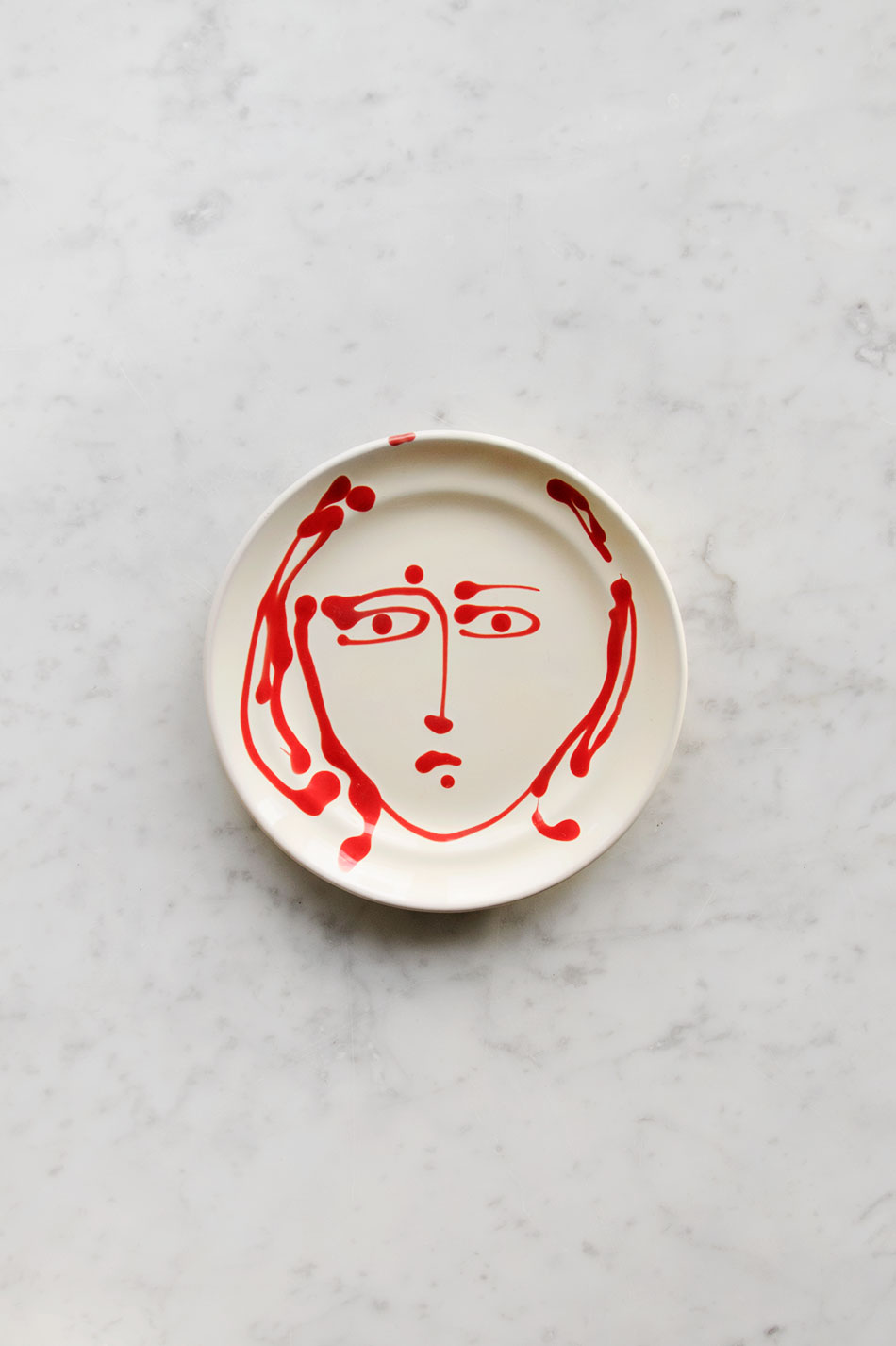Assiett Face Red