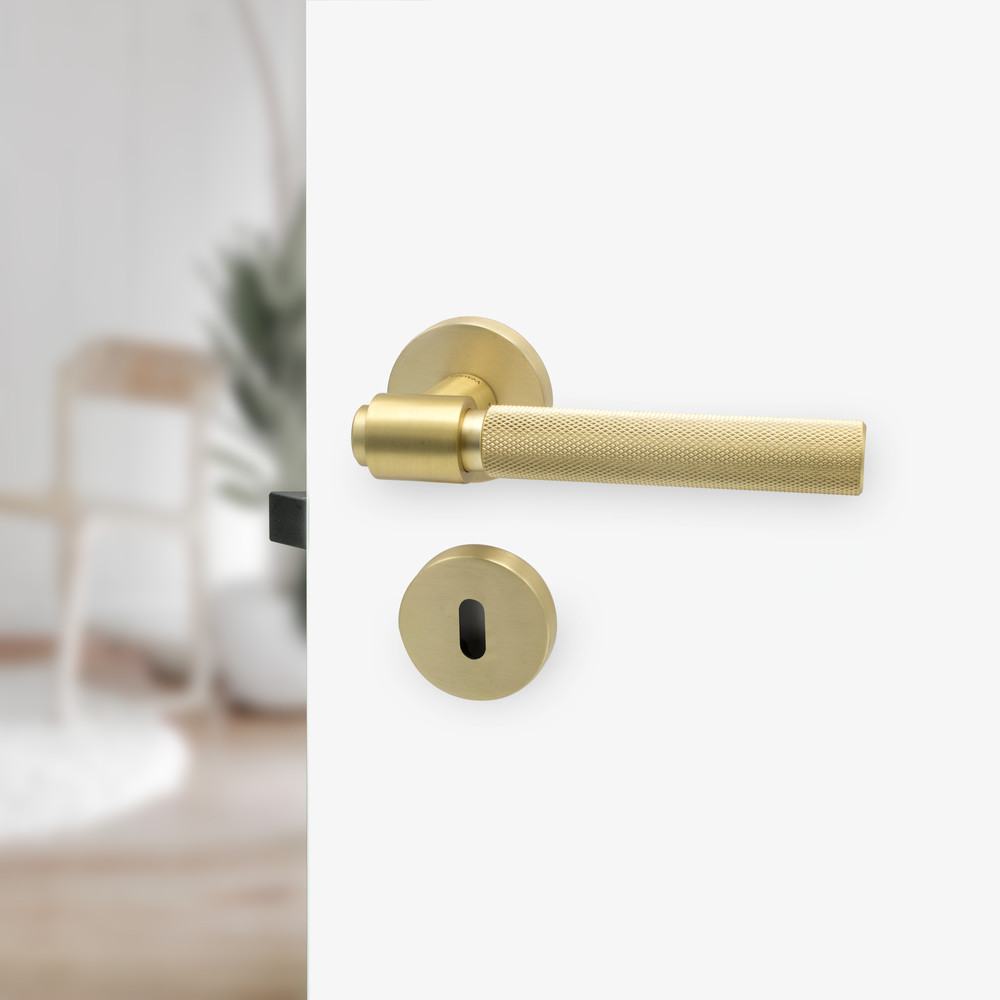 Beslag Design Dörrhandtag Helix 200 Borstad Mässing